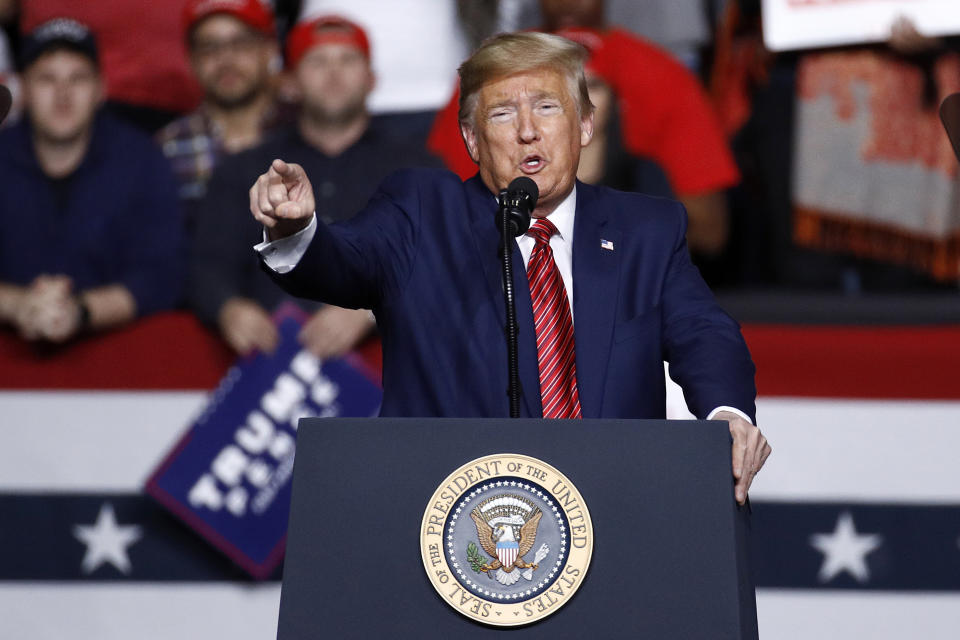 FILE - In this Feb. 28, 2020, file photo, President Donald Trump speaks during a campaign rally in North Charleston, S.C. Trump's Feb. 27, 2020 comment, "One day, it's like a miracle, it will disappear," made while referring to the Coronavirus, holds the number three spot on the Yale Law School librarian's list of the most notable quotes of 2020. (AP Photo/Patrick Semansky, File)