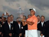 Feb 26, 2017; Palm Beach Gardens, FL, USA; Rickie Fowler celebrates with the trophy after winning The Honda Classic at PGA National (Champion). Mandatory Credit: Jason Getz-USA TODAY Sports