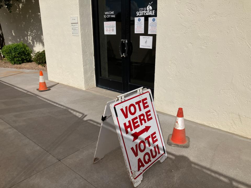 A sign directs voters into Scottsdale City Hall to drop off their ballots on Wednesday Nov. 2, 2022.