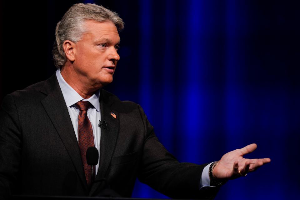 Mike Collins participates in Georgia's 10th Congressional District republican primary election runoff debates on Monday, June 6, 2022, in Atlanta. (AP Photo/Brynn Anderson)