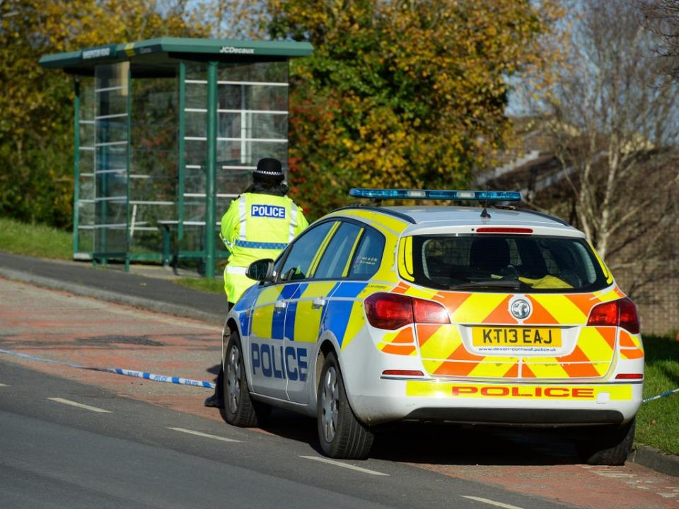 Police at Sheepstor Road bus stop in Plymouth, Devon, where 18-year-old Bobbi-Anne McLeod was last believed to have been seen (Finnbarr Webster/Getty Images)