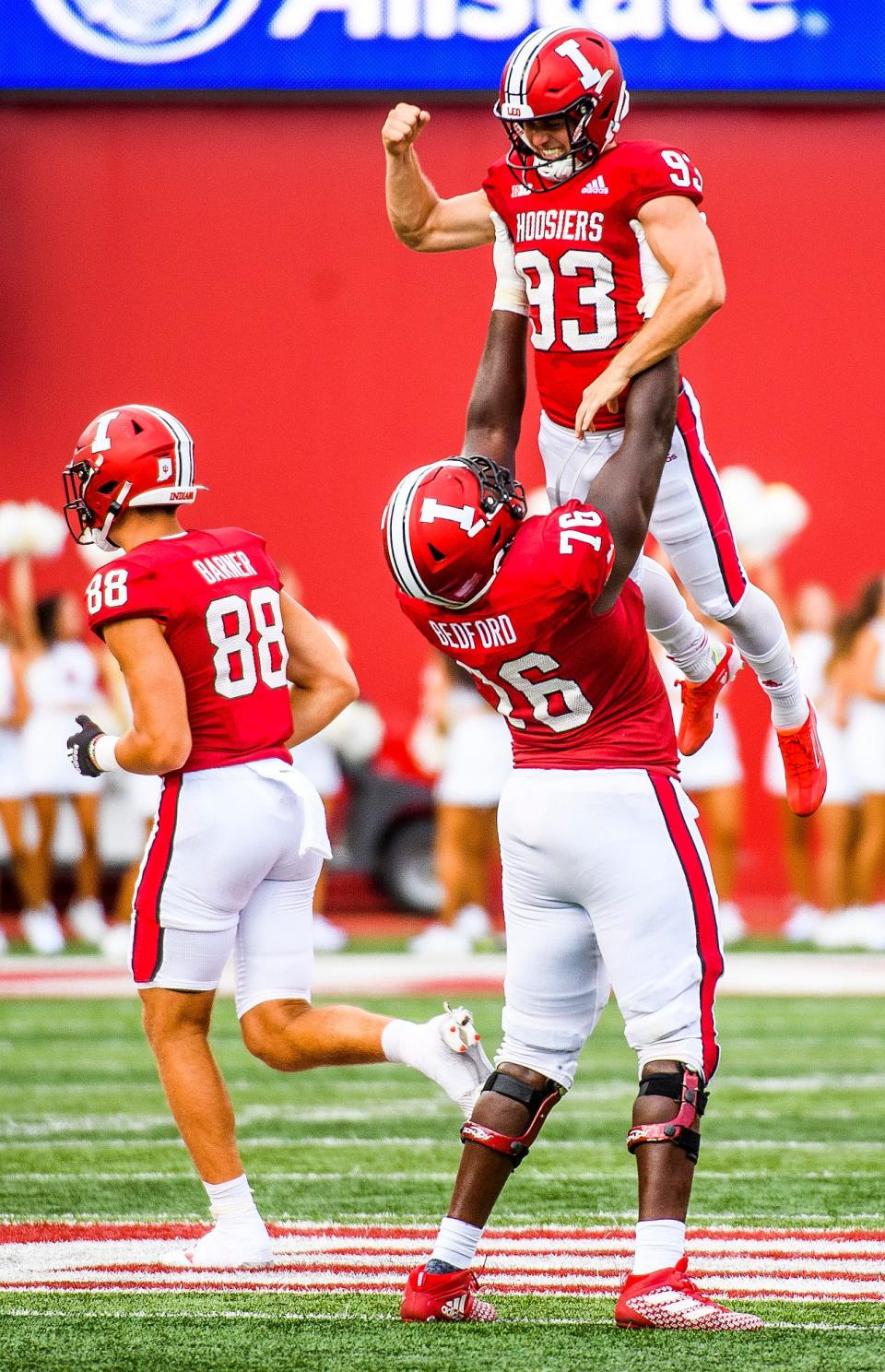 Indiana's Charles Campbell (93) is hoisted up by Matthew Bedford (76) after making a 48 yard field goal during the second half of the Indiana versus Cincinnati football game at Memorial Stadium on Saturday, September 18, 2021.