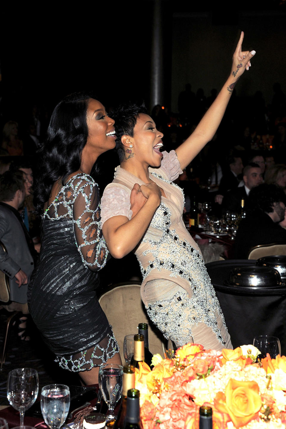 Singers Brandy and Monica attend the 2011 Pre-GRAMMY Gala and Salute To Industry Icons Honoring David Geffen at Beverly Hilton on February 12, 2011 in Beverly Hills, California.