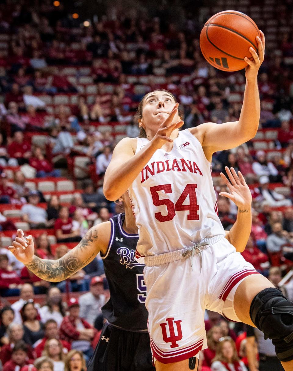 Indiana's Mackenzie Holmes (54) scores during the second half of the Indiana versus Lipscomb women's basketball game at Simon Skjodt Assembly Hall on Sunday, Nov. 19, 2023.