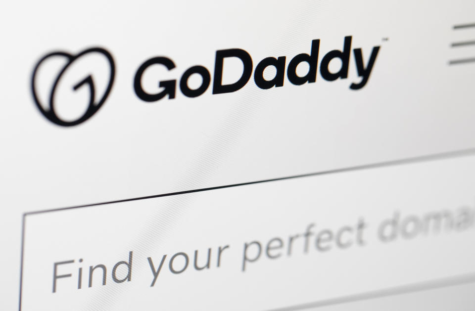 The logo for GoDaddy is displayed on a computer screen on Thursday, Jan. 16, 2020, in New York. (AP Photo/Jenny Kane)