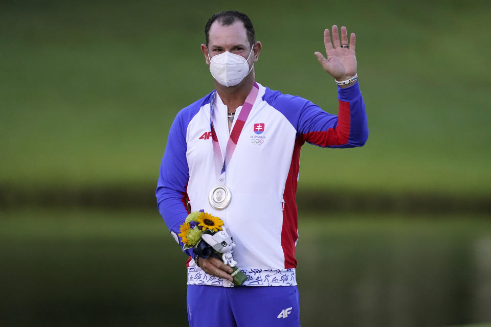 Silver medal winner Rory Sabbatini, of Slovakia, stands on the podium after the men's golf event at the 2020 Summer Olympics, Sunday, Aug. 1, 2021, at the Kasumigaseki Country Club in Kawagoe, Japan, (AP Photo/Matt York)