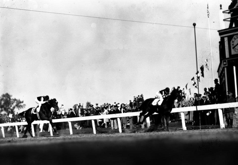 Near the Finish: War Admiral wins the 1937 Kentucky Derby. Louisville hosted the race just months after the 1937 flood had swamped the track. May 8, 1937