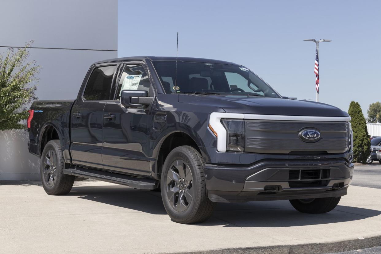 Greenwood - Circa August 2022: Ford F-150 Lightning display. Ford offers the F150 Lightning all-electric truck in Pro, XLT, Lariat, and Platinum models.