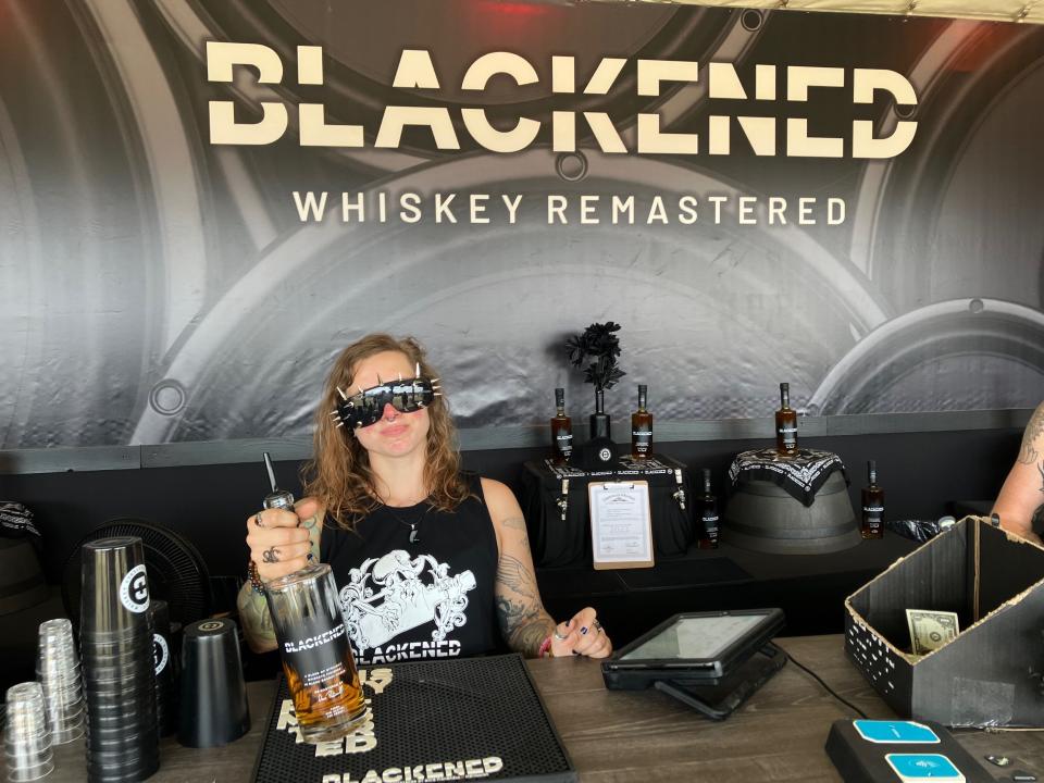 Bartender Savannah Heavrin, who was rocking some sunglasses with big, bold spikes Friday at Louder Than Life, took a few minutes at the Blackened tent to share what makes this whiskey so rock n’ roll.