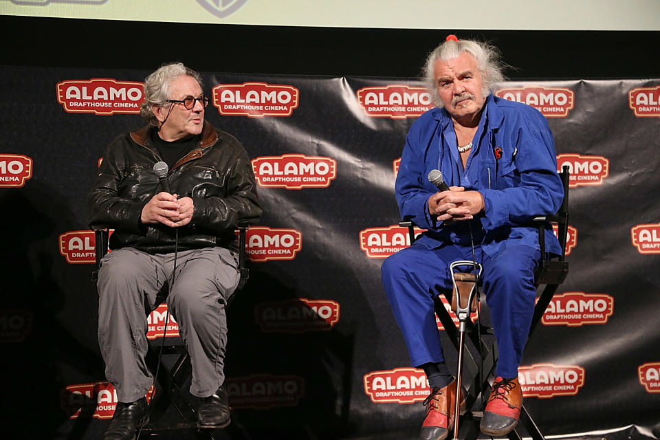 AUSTIN, TX - MAY 09:  Hugh Keays-Byrne (R) and George Miller speak after the Austin premiere of the new film "Mad Max Fury Road" at the Alamo Drafthouse on May 9, 2015 in Austin, Texas.  (Photo by Gary Miller/Getty Images)