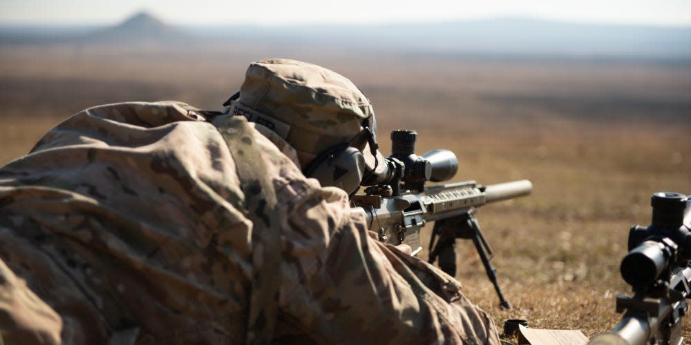 Staff Sgt. Bradley Beeler, Arizona National Guard, lays still as stone before sending each shot downrange with devastating accuracy as the time to true each weapon was winding down one the day before the start of the 50th Winston P. Wilson and 30th Armed Forces Skill at Arms Meeting Sniper Championships