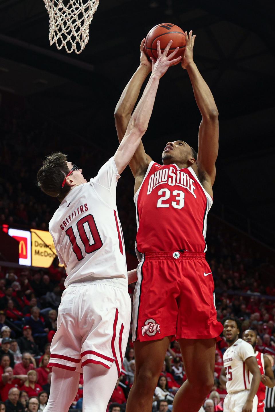 Mar 10, 2024; Piscataway, New Jersey, USA; Ohio State Buckeyes forward Zed Key (23) shoots the ball as Rutgers Scarlet Knights guard Gavin Griffiths (10) defends during the second half at Jersey Mike's Arena. Mandatory Credit: Vincent Carchietta-USA TODAY Sports