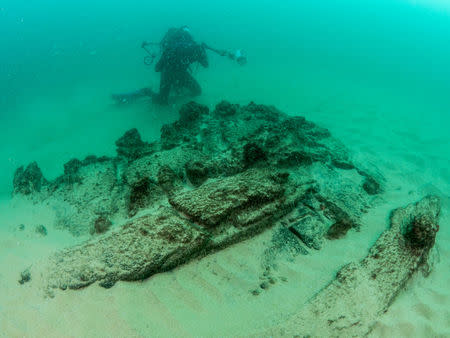 Divers are seen during the discovery of a centuries-old shipwreck, in Cascais in this handout photo released September 24, 2018. Augusto Salgado/Cascais City Hall/Handout via Reuters