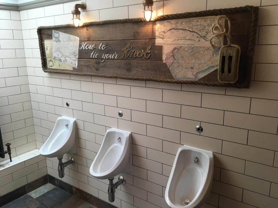 The urinals at the Anchor Inn: Gentlemen's row: the urinals at the Anchor Inn (Simon Calder)