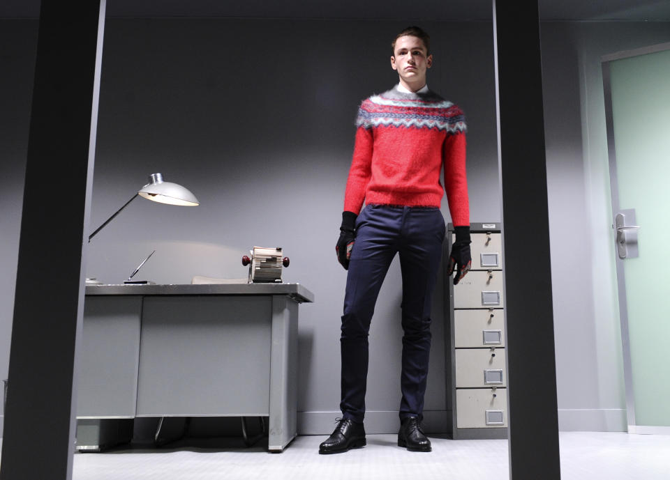 A model wears a creation by French fashion designer Guillaume Henry for Carven's fall-winter 2013/2014 men's fashion collection, presented in Paris, Wednesday, Jan.16, 2013. (AP Photo/Zacharie Scheurer)