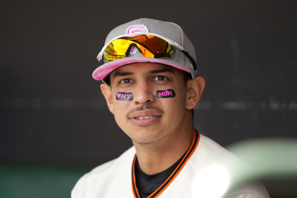 San Francisco Giants' Mauricio Dubon waits in the dugout before a baseball game against the St. Louis Cardinals, Sunday, May 8, 2022, in San Francisco. (AP Photo/Tony Avelar)