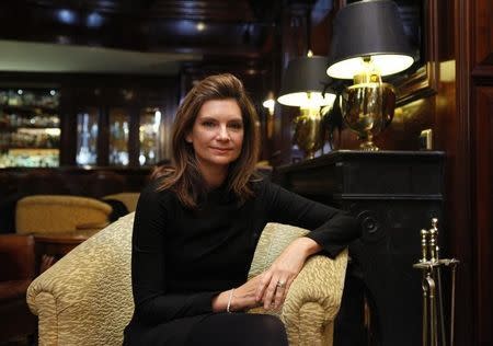 Natalie Massenet, founder and chairman of online fashion retailer Net-A-Porter poses for a picture at the International Herald Tribune luxury goods conference "Techno Luxury" in Berlin November 17, 2009. REUTERS/Thomas Peter