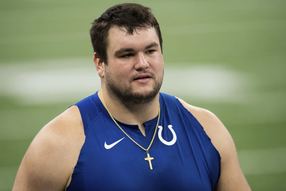 FILE - Indianapolis Colts guard Quenton Nelson (56) warms up on the field before an NFL football game against the Tennessee Titans in Indianapolis, in this Sunday, Nov. 29, 2020, file photo. In a move surprising no one, the Indianapolis Colts on Wednesday, April 28, 2021, exercised the fifth-year option on perennial All-Pro guard Quenton Nelson’s rookie contract. (AP Photo/Zach Bolinger, File)