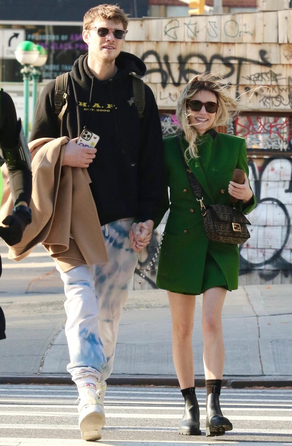 *EXCLUSIVE* - Actress Emma Roberts and her boyfriend Cody John are all smiles as they hold hands and kiss during a romantic PDA-filled moment in Manhattan’s Downtown area
