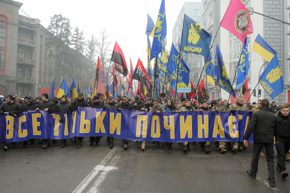 <p>Nationalists carry a banner reading: ‘It’s just the beginning’ during their rally. Three ukrainian far right organizations Azov, Svoboda and Right Sector gather about 10 thosands of its members and supporters for a “March of National Dignity” downtown Kiev, Ukraine on Feb. 22, 2017. (Sergii Kharchenko/NurPhoto via Getty Images) </p>