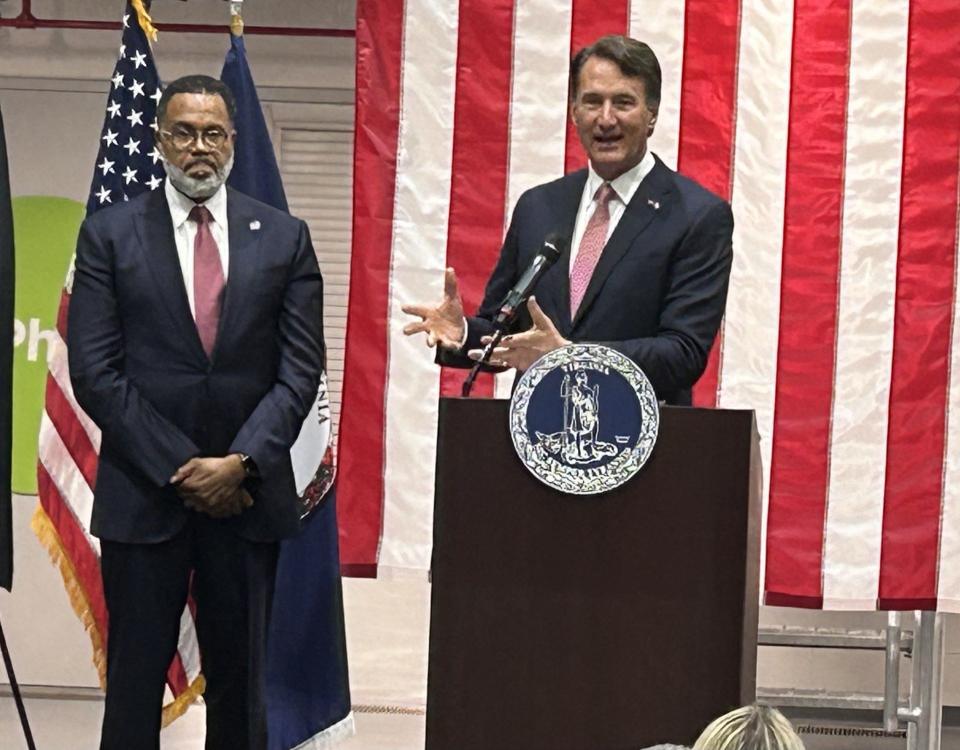 Gov. Glenn Youngkin, right, speaks during an appearance Thursday, July 11, 2024, at Phlow Corp., a pharmaceutical manufacturer in Petersburg, Va. Beside him is Petersburg Mayor Samuel Parham. Youngkin says he is 'humbled' to be mentioned as a possible GOP running mate but 'I love my job' as governor.