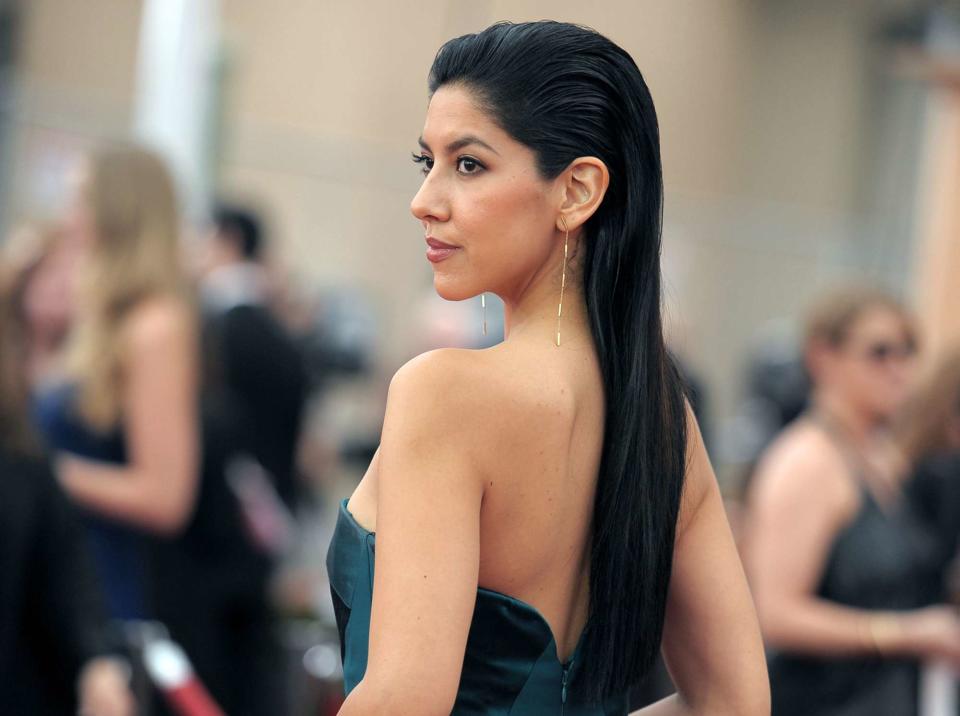 Stephanie Beatriz arrives at the 21st annual Screen Actors Guild Awards at the Shrine Auditorium on Sunday, Jan. 25, 2015, in Los Angeles. (Photo by Richard Shotwell/Invision/AP) Stephanie Beatriz