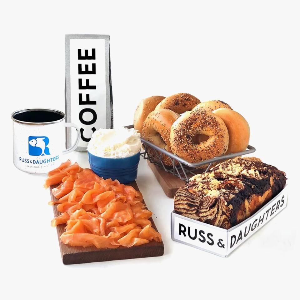 <p><strong>Russ & Daughters</strong></p><p>goldbelly.com</p><p><strong>$179.00</strong></p><p><a href="https://go.redirectingat.com?id=74968X1596630&url=https%3A%2F%2Fwww.goldbelly.com%2Fruss-and-daughters%2F18810-new-york-brunch&sref=https%3A%2F%2Fwww.redbookmag.com%2Flife%2Fg34858754%2Fcreative-hanukkah-gifts-ideas%2F" rel="nofollow noopener" target="_blank" data-ylk="slk:Shop Now;elm:context_link;itc:0;sec:content-canvas" class="link ">Shop Now</a></p><p>If they prefer the real thing (who wouldn't?), <a href="https://www.bestproducts.com/eats/food/g2079/tasty-food-gifts-for-foodies/" rel="nofollow noopener" target="_blank" data-ylk="slk:get them a munchable gift;elm:context_link;itc:0;sec:content-canvas" class="link ">get them a munchable gift</a> that'll bring the whole family together! </p><p>This all-in-one feast features everything they need to host a holiday brunch, including Gaspe smoked salmon, cream cheese, six assorted New York bagels, a chocolate babka, and custom roast coffee beans. It's shipped overnight, so everything arrives fresh and tasty.</p>