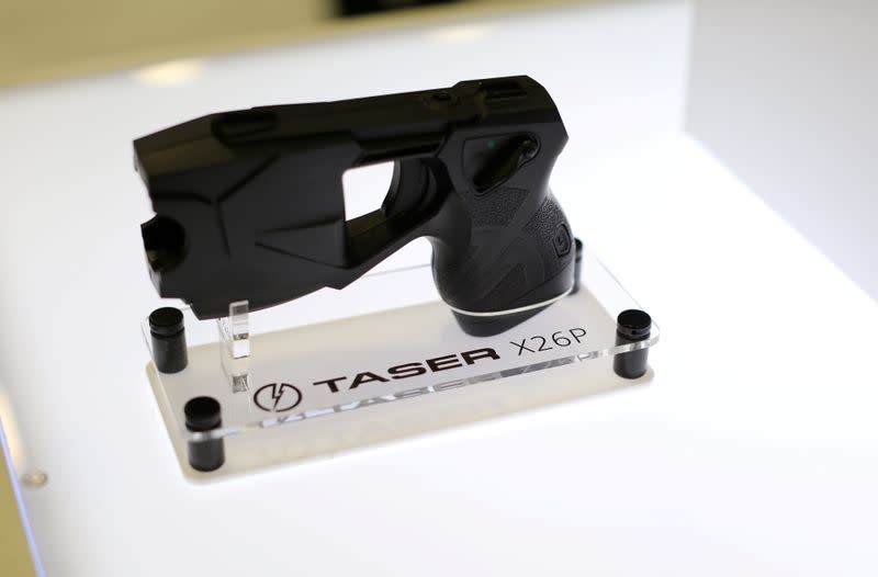 FILE PHOTO: An X26P Taser gun is shown on display at the Taser booth during the International Association of Chiefs of Police conference in San Diego