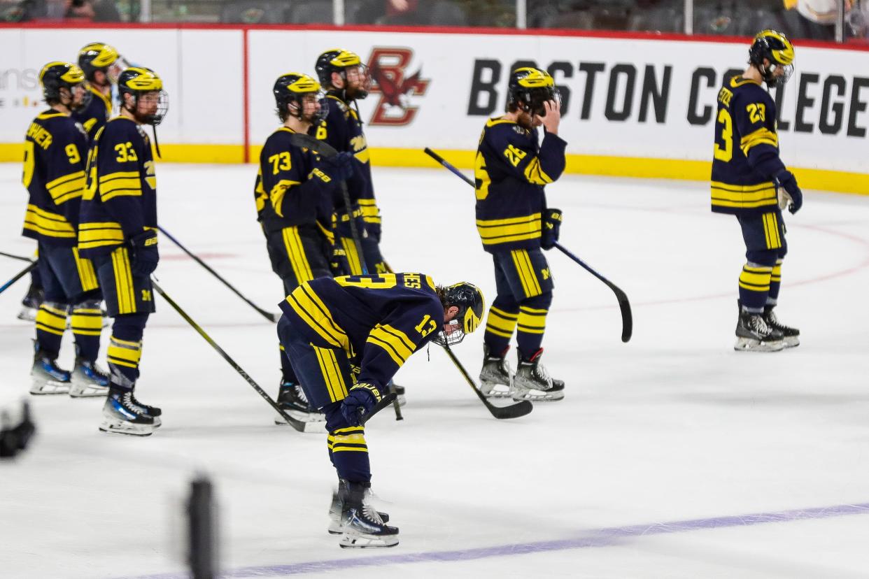 Michigan players react after 4-0 loss to Boston College at the Frozen Four semifinal game at Xcel Energy Center in St. Paul, Minn. on Thursday, April 11, 2024.