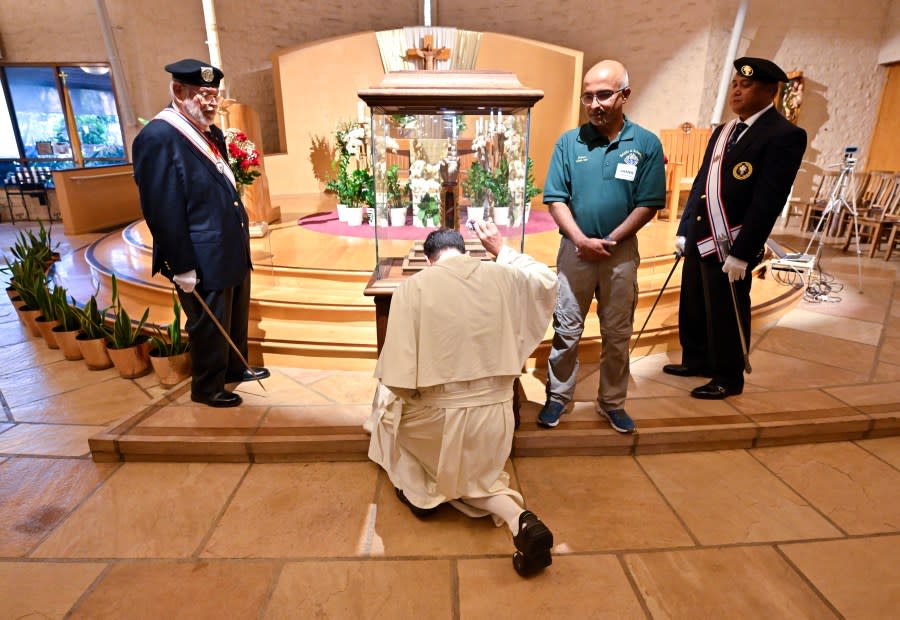 Fr. Charbel Grbavac, from St. Michael's Abbey, visits the relic of St. Jude Thaddeus on display at Santiago de Compostela Catholic Church in Lake Forest, CA, on Monday, April 29, 2024.