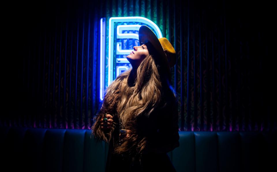 Lainey Wilson sits for a portrait in Nashville , Tenn., Tuesday, Feb. 22, 2022. Wilson was nominated as a songwriter for Song of the Year at the 2022 ACM Awards for her hit “Things A Man Oughta Know”.