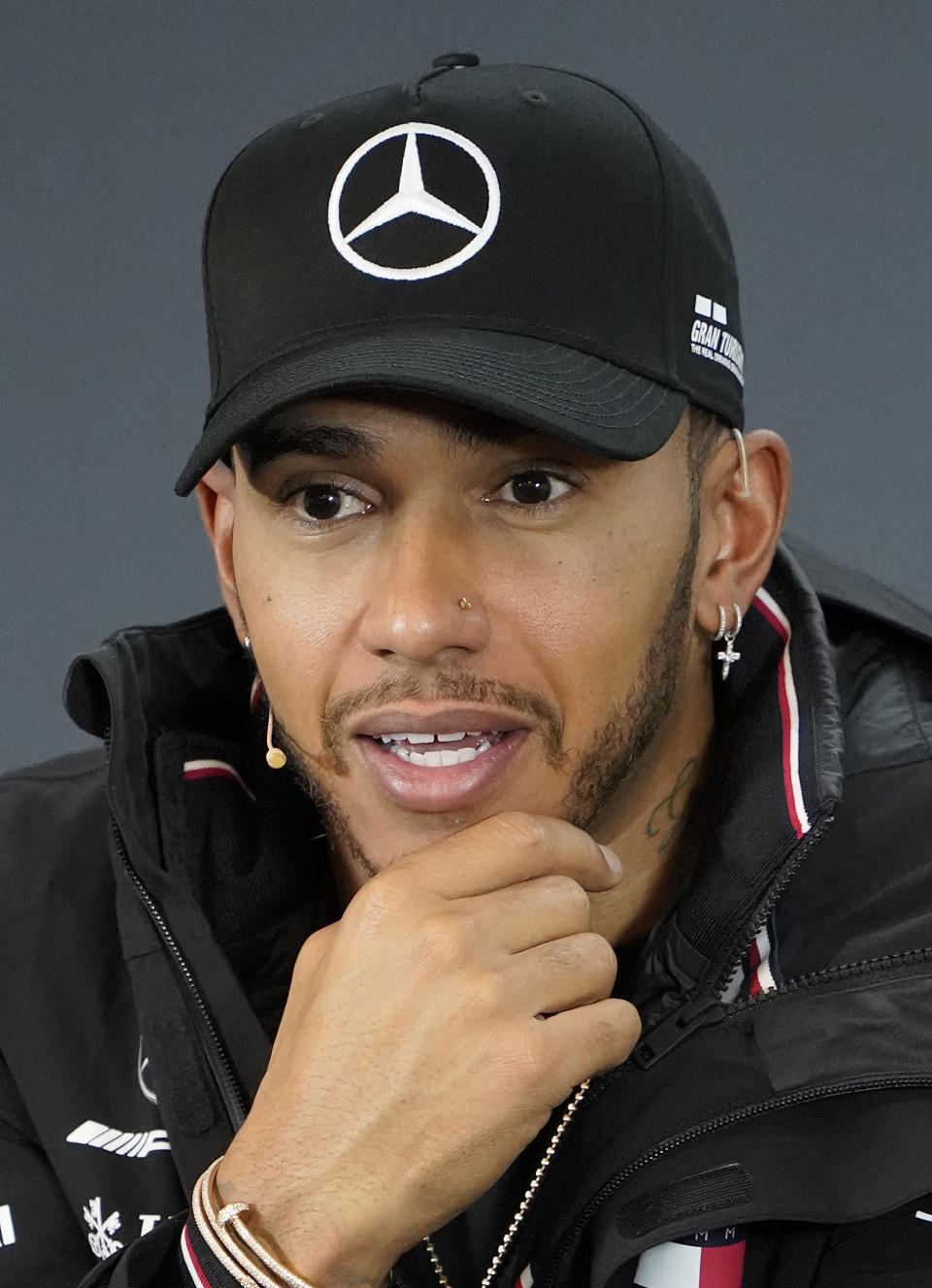 Mercedes driver Lewis Hamilton, of Britain, speaks during a news conference for the Formula One U.S. Grand Prix auto race at the Circuit of the Americas, Thursday, Oct. 18, 2018, in Austin, Texas. (AP Photo/Darren Abate)