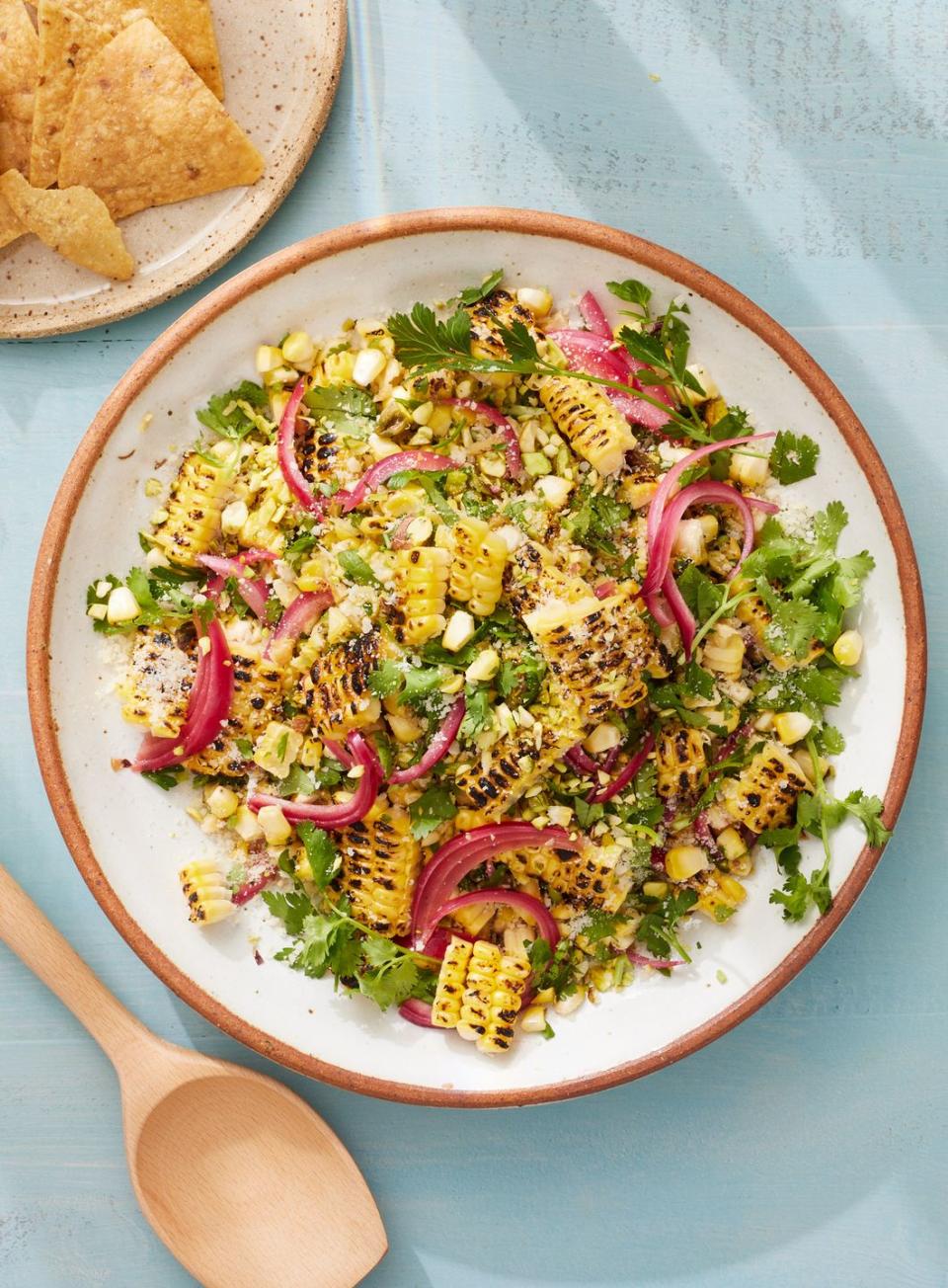 <p>This versatile, flavorful <a href="https://www.delish.com/cooking/g1463/sweet-corn-recipes/" rel="nofollow noopener" target="_blank" data-ylk="slk:corn;elm:context_link;itc:0;sec:content-canvas" class="link ">corn</a> salad is the perfect way to use up leftover <a href="https://www.delish.com/cooking/recipe-ideas/a19637515/best-grilled-corn-on-the-cob-recipe/" rel="nofollow noopener" target="_blank" data-ylk="slk:grilled corn;elm:context_link;itc:0;sec:content-canvas" class="link ">grilled corn</a>. Mix and match your favorite cheeses, herbs, and nuts, but keep the citrus for brightness and oil for a little richness. And if you like a little *kick*, add some sliced jalapeños or a big pinch of red chili flakes. Delicious served cold or at room temperature, this easy dish is summertime gold.</p><p>Get the <strong><a href="https://www.delish.com/cooking/recipe-ideas/a39788374/grilled-corn-salad-recipe/" rel="nofollow noopener" target="_blank" data-ylk="slk:Grilled Corn Salad recipe;elm:context_link;itc:0;sec:content-canvas" class="link ">Grilled Corn Salad recipe</a></strong>.</p>