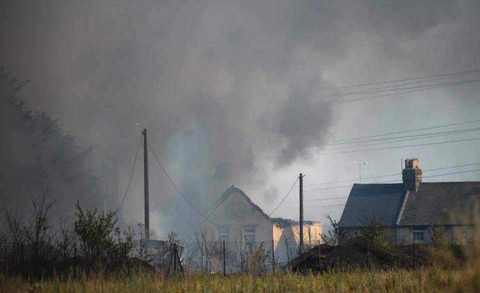 The major a blaze in the village of Wennington, east London. (Yui Mok/PA) (PA Wire)