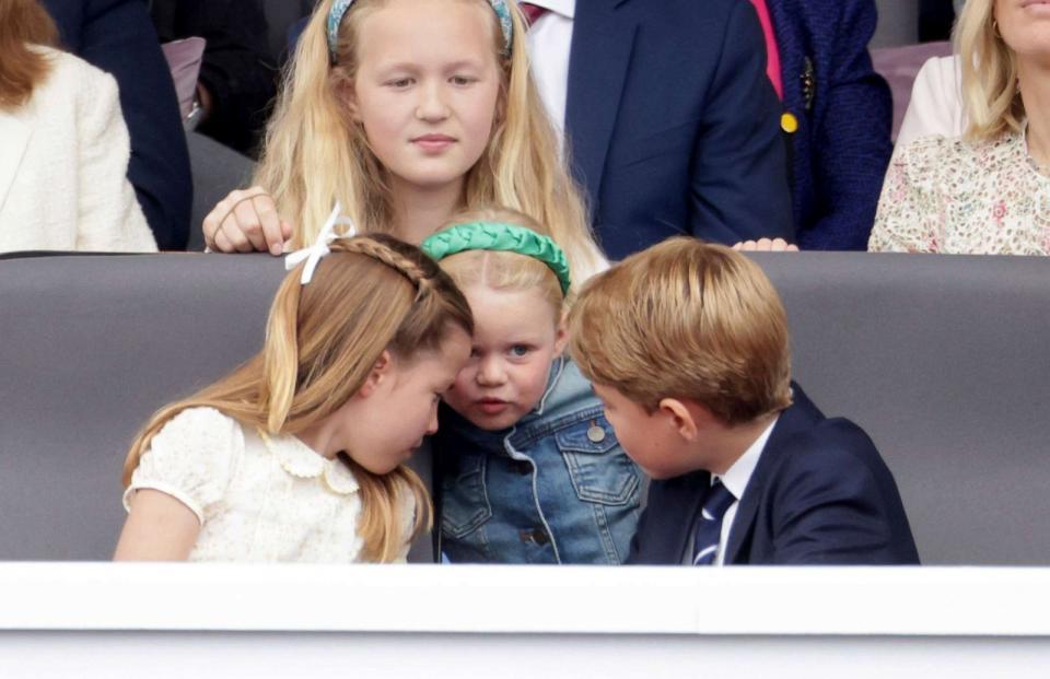 PHOTO: SSavannah Phillips watches as Mia Tindall, Princess Charlotte, and Prince George speak, during the Platinum Jubilee Pageant outside Buckingham Palace in London, June 5, 2022. (Chris Jackson/AP)