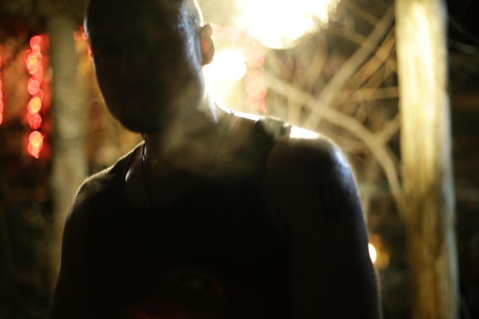 Steam rises from bathhouse worker Roman Korotkov at the British Banya bathhouse, Saturday, Feb. 15, 2014, in Krasnaya Polyana, Russia. Preparations for the bathing party begin late in the afternoon, at least three hours before the guests arrive. (AP Photo/Jae C. Hong)