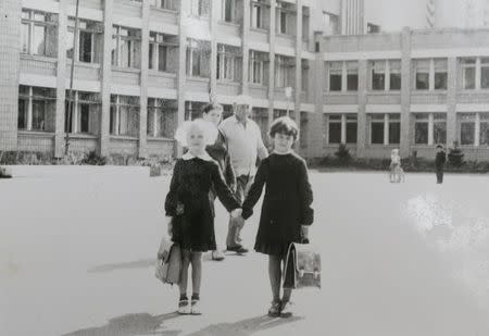 An undated family photograph shows Olga Korolova (R) before the Chernobyl nuclear disaster in in the town of Pripyat, Ukraine. For residents of Chernobyl, a three-day evacuation turned into a thirty-year exile. Handout via REUTERS