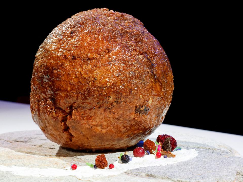 A meatball made from flesh cultivated using the DNA of an extinct woolly mammoth is presented at NEMO Science Museum created by a cultured meat company, in Amsterdam, Netherlands March 28, 2023.