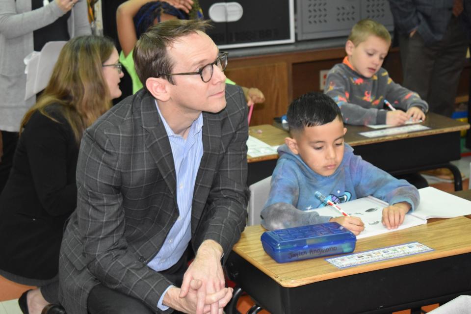 Texas Education Commissioner Mike Morath listens during class at Southern Hills Elementary School on Tuesday, Feb. 20,2024.