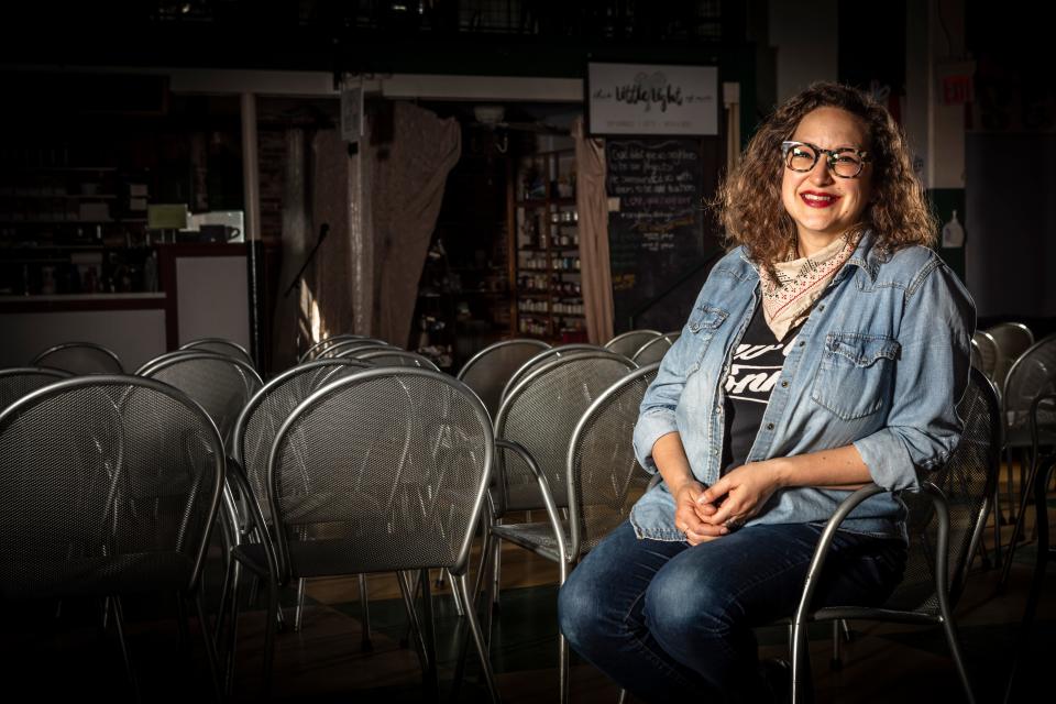 JJ Sheffer seated in Central Market before one of her events takes place in Downtown York.