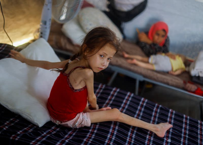 Malnourished Palestinian children receive treatment at the IMC field hospital in Deir Al-Balah, central Gaza Strip