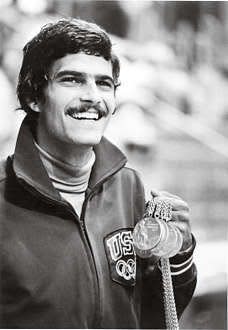 Mark Spitz flashes his gold medals in 1972. Photo courtesy of Indiana University.