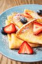 <p>These come together faster than <a href="https://www.delish.com/cooking/menus/recipes/a50760/perfect-pancakes-recipe/" rel="nofollow noopener" target="_blank" data-ylk="slk:pancakes;elm:context_link;itc:0;sec:content-canvas" class="link ">pancakes</a> or <a href="https://www.delish.com/cooking/recipe-ideas/recipes/a51472/best-homemade-waffle-recipe/" rel="nofollow noopener" target="_blank" data-ylk="slk:waffles;elm:context_link;itc:0;sec:content-canvas" class="link ">waffles</a>, and unlike those two other breakfast treats, crepes are begging to be topped with more than just maple syrup. Fruit, <a href="https://www.delish.com/cooking/recipe-ideas/g2762/ways-to-use-nutella/" rel="nofollow noopener" target="_blank" data-ylk="slk:Nutella;elm:context_link;itc:0;sec:content-canvas" class="link ">Nutella</a>, gruyere cheese and <a href="https://www.delish.com/cooking/recipe-ideas/recipes/a50251/vegetable-gravy-recipe/" rel="nofollow noopener" target="_blank" data-ylk="slk:mushroom gravy;elm:context_link;itc:0;sec:content-canvas" class="link ">mushroom gravy</a> are just the beginning of our favorite toppings. <br><br>Get the <strong><a href="https://www.delish.com/cooking/recipe-ideas/recipes/a52114/easy-basic-crepe-recipe/" rel="nofollow noopener" target="_blank" data-ylk="slk:Easy Crêpes recipe;elm:context_link;itc:0;sec:content-canvas" class="link ">Easy Crêpes recipe</a>.</strong></p>