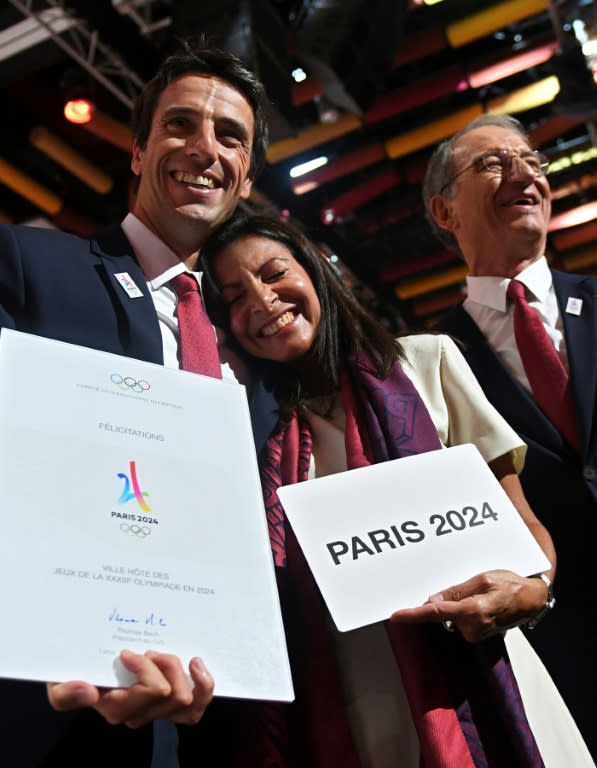 L-R: Paris 2024 Co-Chairman Tony Estanguet, Paris Mayor Anne Hidalgo and French National Olympic Committee president Denis Masseglia celebrate after Paris was awarded with the 2024 Olympic Games