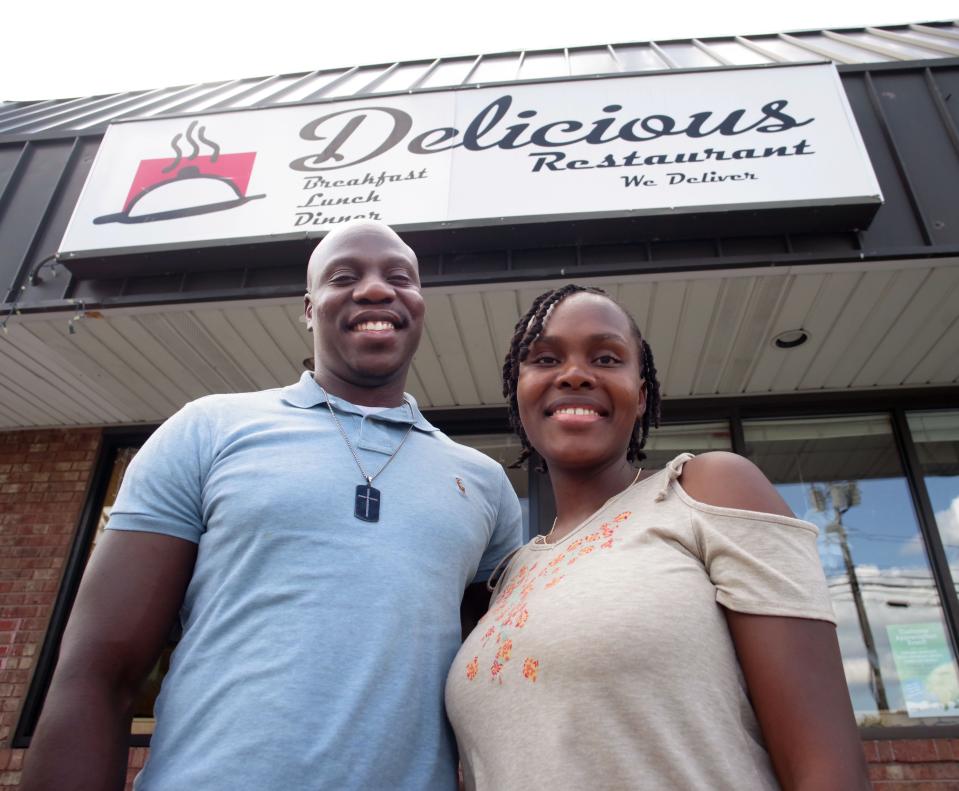 Owners of Delicious Restaurant in Brockton are Roody Musac and his wife Junette Musac, in front of their place on Wednesday, Aug. 31, 2022.