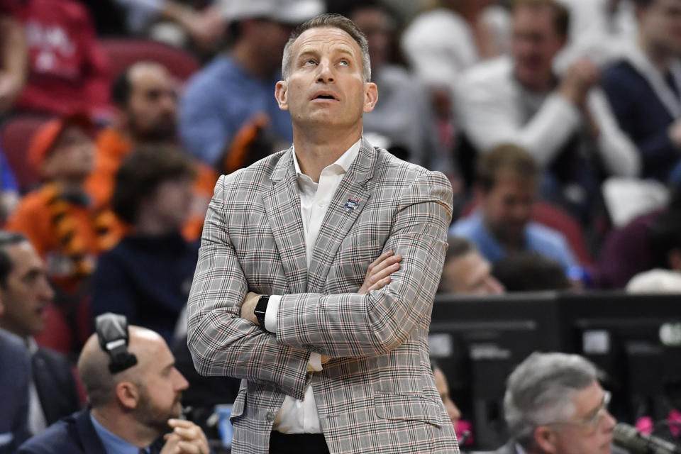 Alabama head coach Nate Oats looks at the scoreboard in the second half of a Sweet 16 round college basketball game in the South Regional of the NCAA Tournament against San Diego State, Friday, March 24, 2023, in Louisville, Ky. (AP Photo/Timothy D. Easley)