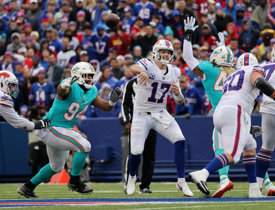 Bills quarterback Josh Allen makes a throw under pressure. 