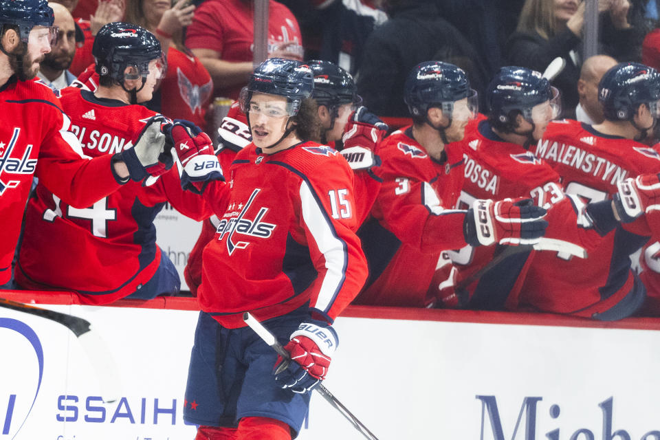 Washington Capitals left wing Sonny Milano (15) is congratulated for his goal against the Philadelphia Flyers during the second period of an NHL hockey game Friday, March 1, 2024, in Washington. (AP Photo/Manuel Balce Ceneta)