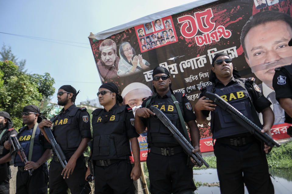 Rapid Action Battalion (RAB) members patrol in Dhaka - Chittagong highway during a a three-day blockade called by main opposition Bangladesh Nationalist Party (BNP) in Dhaka, Bangladesh, Tuesday, Oct.31, 2023. BNP has called for country-wide blockade to demand the resignation of Prime Minister Sheikh Hasina and the transfer of power to a non-partisan caretaker government to oversee general elections. (AP Photo/Mahmud Hossain Opu)