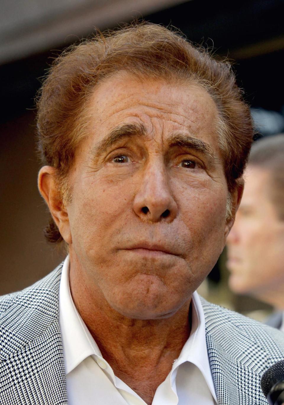 FILE - In this Sept. 7, 2012 file photo, casino mogul Steve Wynn arrives at court for his slander trial in Los Angeles. A Los Angeles jury on Monday Sept. 10, 2012 awarded Wynn a $20 million judgment against “Girls Gone Wild” founder Joe Francis in a slander trial. Francis had claimed Wynn threatened to kill him and bury him in the desert, but the jury determined that there was substantial evidence Francis knew the statements were false when he made them. (AP Photo/Nick Ut, File)